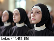 Serene nuns in prayerful contemplation. Стоковое AI-изображение, AI-художник Иван Рябоконь / Фотобанк Лори
