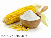 Fresh corn and cornflour on white background. Стоковое AI-изображение, AI-художник Иван Рябоконь / Фотобанк Лори