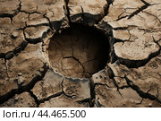 Arid earth, cracks and crevices in dry soil. Стоковое AI-изображение, AI-художник Иван Рябоконь / Фотобанк Лори
