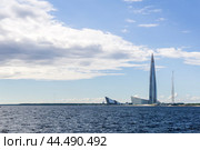 Panoramic waterscape with Lakhta Centre skyscraper on the shore of the Gulf of Kronshtadt in st/ Petersburg (2024 год). Редакционное фото, фотограф Евгений Харитонов / Фотобанк Лори