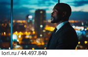 Business professional reflecting on future opportunities during twilight in a modern cityscape setting. Стоковое AI-изображение, AI-художник Сергей Толмачёв / Фотобанк Лори