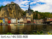 Residential buildings and Notre Dame de Dinant along Meuse River. Стоковое фото, фотограф Яков Филимонов / Фотобанк Лори