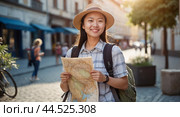A cheerful Chinese female tourist with a hat and backpack, holding a map and exploring a European city during her vacation. Стоковое AI-изображение, AI-художник Tatiana Syrtseva / Фотобанк Лори