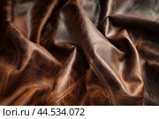 Highresolution image showcasing the rich texture of premium brown leather material. Стоковое AI-изображение, AI-художник Иван Рябоконь / Фотобанк Лори