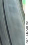 The front right wheel of the crossover rolls along an uneven country road. Very close-up. Стоковое видео, видеограф Ярославский Максим / Фотобанк Лори