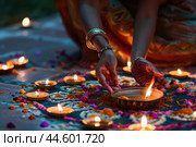 Traditional diwali celebration with diyas and rangoli. Стоковое AI-изображение, AI-художник Иван Рябоконь / Фотобанк Лори