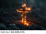 Burning wooden cross stands ignited with flames glowing in the dim light of dusk. Стоковое AI-изображение, AI-художник Иван Рябоконь / Фотобанк Лори
