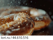 Glistening sugarcoated doughnuts in closeup. Стоковое AI-изображение, AI-художник Иван Рябоконь / Фотобанк Лори