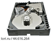 Жесткий диск HDD изолирован на белом фоне. Hard disk drive HDD isolated on white background. Стоковое фото, фотограф Татьяна Д / Фотобанк Лори