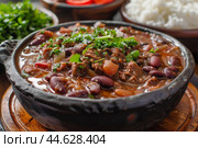 Traditional brazilian feijoada in cast iron pot. Стоковое AI-изображение, AI-художник Иван Рябоконь / Фотобанк Лори