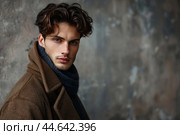 Handsome young man with intense gaze. Стоковое AI-изображение, AI-художник Иван Рябоконь / Фотобанк Лори