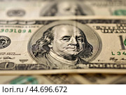 Macro close up of benjamin franklin on one hundred dollar bill. Стоковое AI-изображение, AI-художник Иван Рябоконь / Фотобанк Лори