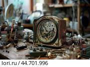 Old broken dismounted clock with visible mechanism lying on watchmaker workbench. Стоковое AI-изображение, AI-художник Иван Рябоконь / Фотобанк Лори