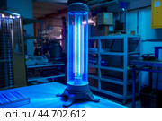 Powerful uv light sanitizer machine is disinfecting and sterilizing room. Стоковое AI-изображение, AI-художник Иван Рябоконь / Фотобанк Лори