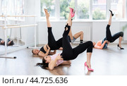Female dancer in high heels performing contemporary dance on floor. Стоковое фото, фотограф Яков Филимонов / Фотобанк Лори
