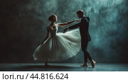 Ballet dancers perform an elegant duet in a dramatic dimly lit studio with smoky background effects during an evening rehearsal. Стоковое AI-изображение, AI-художник Сергей Толмачёв / Фотобанк Лори