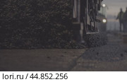 Asphalt laying, road mixture, road equipment, bitumen укладка асфальта, смесь для дороги, дорожная техника, битум. Стоковое видео, видеограф Опока Алексей / Фотобанк Лори