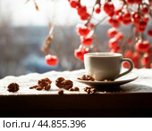 A cup of morning coffee on the veranda in the autumn garden. Autumn still life. Стоковое AI-изображение, AI-художник Сергей Елизарьев / Фотобанк Лори
