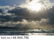 Sun beams over the Atlantic ocean after the rain. Стоковое фото, фотограф YuryKara / Фотобанк Лори
