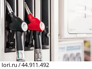Gas station. Refueling the car with gasoline. A Russian fuel dispenser at a gas station. Rising fuel prices around the world. Стоковое фото, фотограф Photojuli / Фотобанк Лори