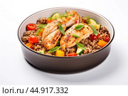 Buckwheat with chicken breast, baked with vegetables. Rich source of protein, fiber and vitamins to keep you energized and fit during your workouts. Стоковое AI-изображение, AI-художник Veniamin Kraskov / Фотобанк Лори