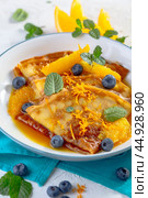 Crepes suzette - pancakes with orange sauce. Стоковое фото, фотограф Марина Сапрунова / Фотобанк Лори