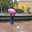 Heavy rain in Alexander Garden in center of St. Petersburg, at walls of Admiralty near fountain. Russia (2024 год). Редакционное фото, фотограф Валерия Попова / Фотобанк Лори
