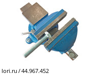 Голубые тиски на белом фоне. Blue vise on a white background. Стоковое фото, фотограф Татьяна Д / Фотобанк Лори