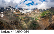 Mountains landscape. snow-capped peaks. Idyllic mountain background. Panoramic view of beautiful mountain landscape. mountaineering, trekking and mountain climbing. Стоковое фото, фотограф Павел Муравьев / Фотобанк Лори