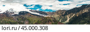 Mountains landscape. snow-capped peaks. Idyllic mountain background. Panoramic view of beautiful mountain landscape. Стоковое фото, фотограф Павел Муравьев / Фотобанк Лори
