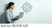 Asian Businesswoman achieving goals with laptop, focused professional reaching target, corporate success, online strategy execution, goal-oriented work ethic, career growth. Стоковое AI-изображение, AI-художник Павел Муравьев / Фотобанк Лори