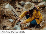 Archaeologist unearthing ancient artifacts at excavation site. Стоковое AI-изображение, AI-художник Иван Рябоконь / Фотобанк Лори