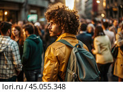Portrait of a curly-haired mulatto traveler in a yellow jacket and with a backpack in the city. Traveling alone is a lifestyle. A young tourist is enjoying his autumn vacation. Стоковое AI-изображение, AI-художник Photojuli / Фотобанк Лори