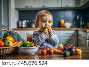 Healthy baby food. The first meal. Feeding the baby. A cute kid tastes fresh vegetables. Стоковое AI-изображение, AI-художник Photojuli / Фотобанк Лори