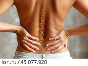 Lumbar intervertebral spine hernia, woman with back pain on a gray background, spinal disc disease, health problems concept. Стоковое AI-изображение, AI-художник Станислав Тарко / Фотобанк Лори