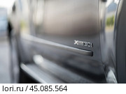 KRASNOYARSK, RUSSIA - June 15, 2024: Black BMW X5 E70. Редакционное фото, фотограф Плотников Дмитрий / Фотобанк Лори
