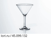 Glass cup and cocktail stemware mockup. Transparent glassware for martini and alcohol drinks. crystal utensil for beverage serving. Стоковое фото, фотограф Павел Муравьев / Фотобанк Лори