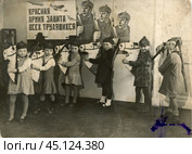 Утренник в детском саду. Дети в будённовках изображают красноармейцев на лошадях, 1926- 1930-е гг. Стоковое фото, фотограф Retro / Фотобанк Лори