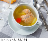 Salmon offal soup with vegetables - potatoes, carrots and parsley. Стоковое фото, фотограф Яков Филимонов / Фотобанк Лори