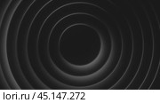 Black concentric circles pulsating on black background. Стоковое видео, видеограф Данил Руденко / Фотобанк Лори