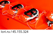 5D virtual reality glasses on a red background. Стоковое фото, фотограф Igor Skripachev / Фотобанк Лори