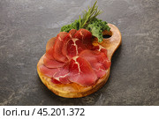 Italian cuisine - bresaola di Milano. Стоковое фото, фотограф Андрей Старостин / Фотобанк Лори