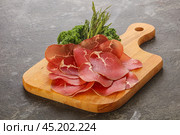 Italian cuisine - bresaola di Milano. Стоковое фото, фотограф Андрей Старостин / Фотобанк Лори