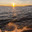 Beautiful landscape of Baikal Lake in December at sunset. Waves crash of icy pier against backdrop of setting sun. Natural background. Outdoor recreation and lake travel. Стоковое фото, фотограф Виктория Катьянова / Фотобанк Лори