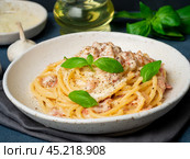 Carbonara pasta. Spaghetti with pancetta, egg, parmesan cheese. Стоковое фото, фотограф Natalia Gdovskaia / Фотобанк Лори