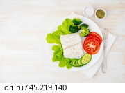 Steamed cod fish. Paleo, keto, fodmap healthy diet with vegetables. Стоковое фото, фотограф Natalia Gdovskaia / Фотобанк Лори