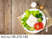 Steamed cod fish. Paleo, keto, fodmap healthy diet with vegetables. Стоковое фото, фотограф Natalia Gdovskaia / Фотобанк Лори