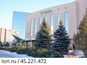 Volgograd, Russia - January 25, 2023. SBER logo on the office. New design of Sberbank. Редакционное фото, фотограф Екатерина Золина / Фотобанк Лори