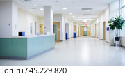 Hospital hallway, reception clinic background. luxury hospital corridor. Blur clinic interior background with defocused effect. Healthcare and medical concept. Стоковое AI-изображение, AI-художник Павел Муравьев / Фотобанк Лори