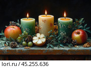 Still life in warm tones. In the center of the frame are three lit candles decorated with floral patterns, surrounded by various fruits, pine cones and greenery. On the table are apples, bunches of grapes, half an apple with visible slices, nuts and fir cones. The dark background makes the composition expressive, focusing attention on details and creating a cozy atmosphere. Such a photo can be used in thematic content on autumn or winter themes, for interior decoration, and also as a holiday decor. Стоковое AI-изображение, AI-художник Анна Кривицкая / Фотобанк Лори